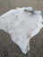 Hello14 89 x 79 extra large white and brown speckled cowhide rug with natural edges showcases unique characteristics