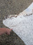 Hello14 extra large cowhide rug with white brown and black speckles featuring unique characteristics and natural edge