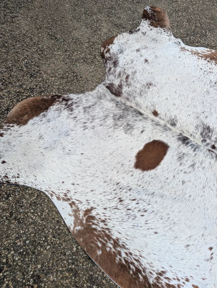 Hello15 large cowhide rug in white and brown spotted natural fur texture with unique characteristics for beautiful rugs