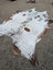 Hello15 large cowhide rug in white and brown with natural fur texture and unique characteristics for beautiful rugs