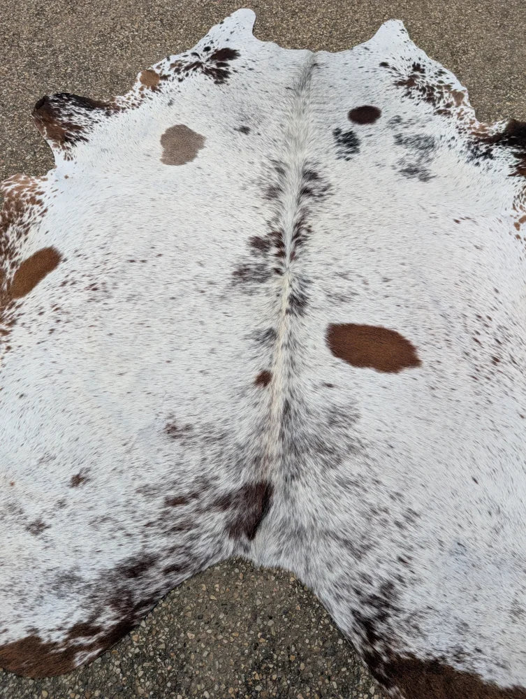 Hello15 large cowhide rug with white and brown spotted natural fur texture showcasing unique characteristics