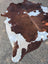 Hello3 large cowhide rug 88 x 78 with brown and white natural patches showing unique rustic charm