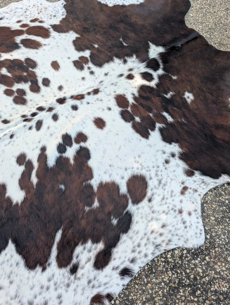 Large cowhide rug hello4 with brown and white spots natural fur texture adds rustic charm and unique characteristics