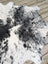 Hello6 large black and white cowhide rug with natural irregular edge showcasing unique characteristics for beautiful rugs