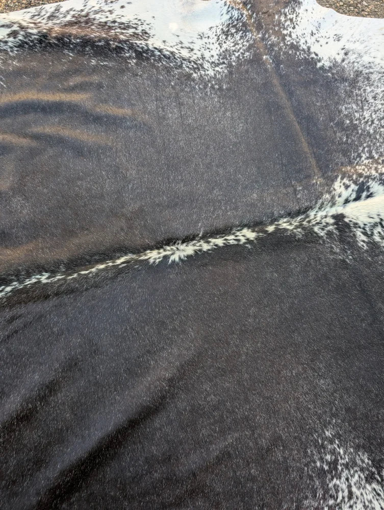 Hello9 83 x 72 large black and white cowhide rug with natural fur texture and unique rustic charm