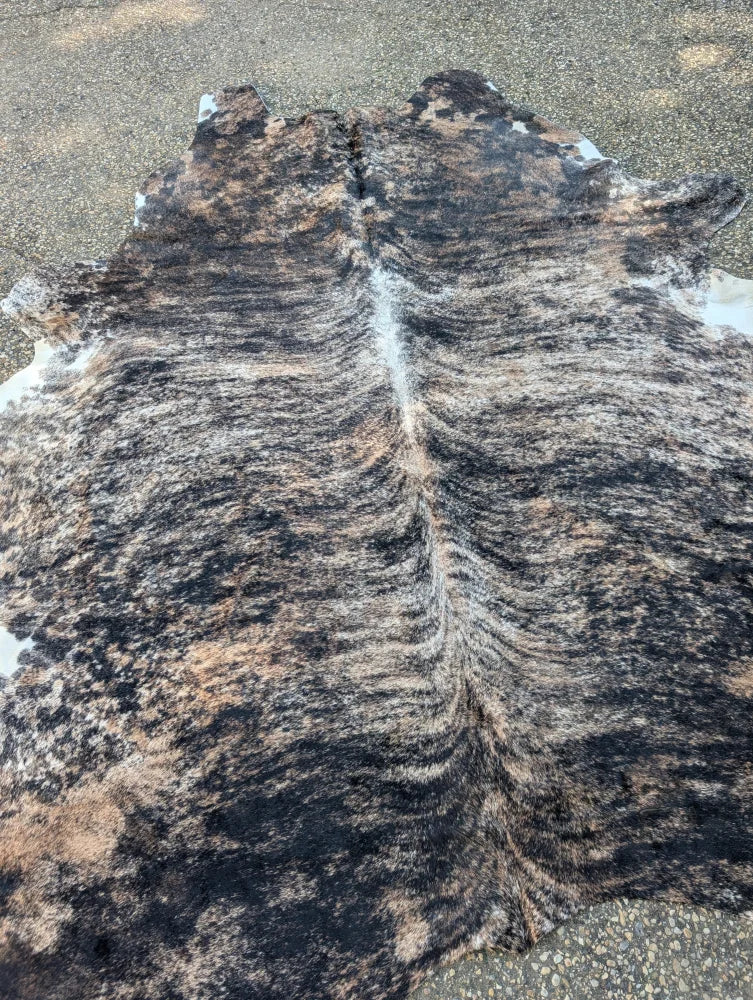 Hellow#5 88 x 81 large cowhide rug with unique black and tan marbled pattern adding rustic charm