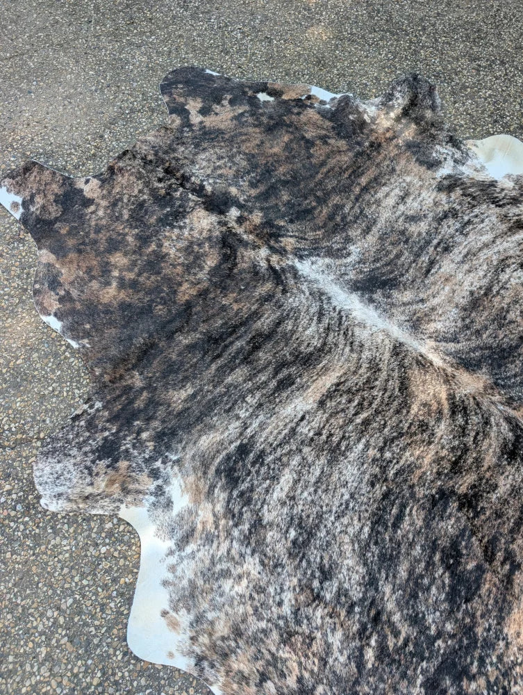 Hellow#5 88 x 81 large cowhide rug with unique mottled black brown and white fur offering rustic charm