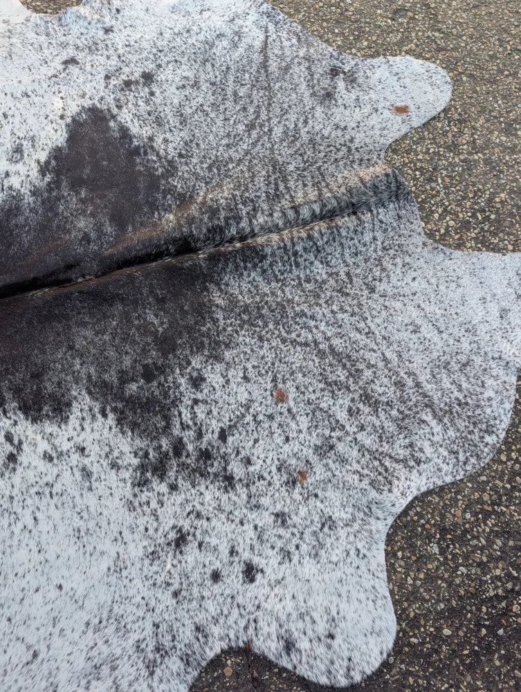 Hellow#8 96.5 x 79 large cowhide rug with speckled black and white pattern and unique rustic charm textured surface