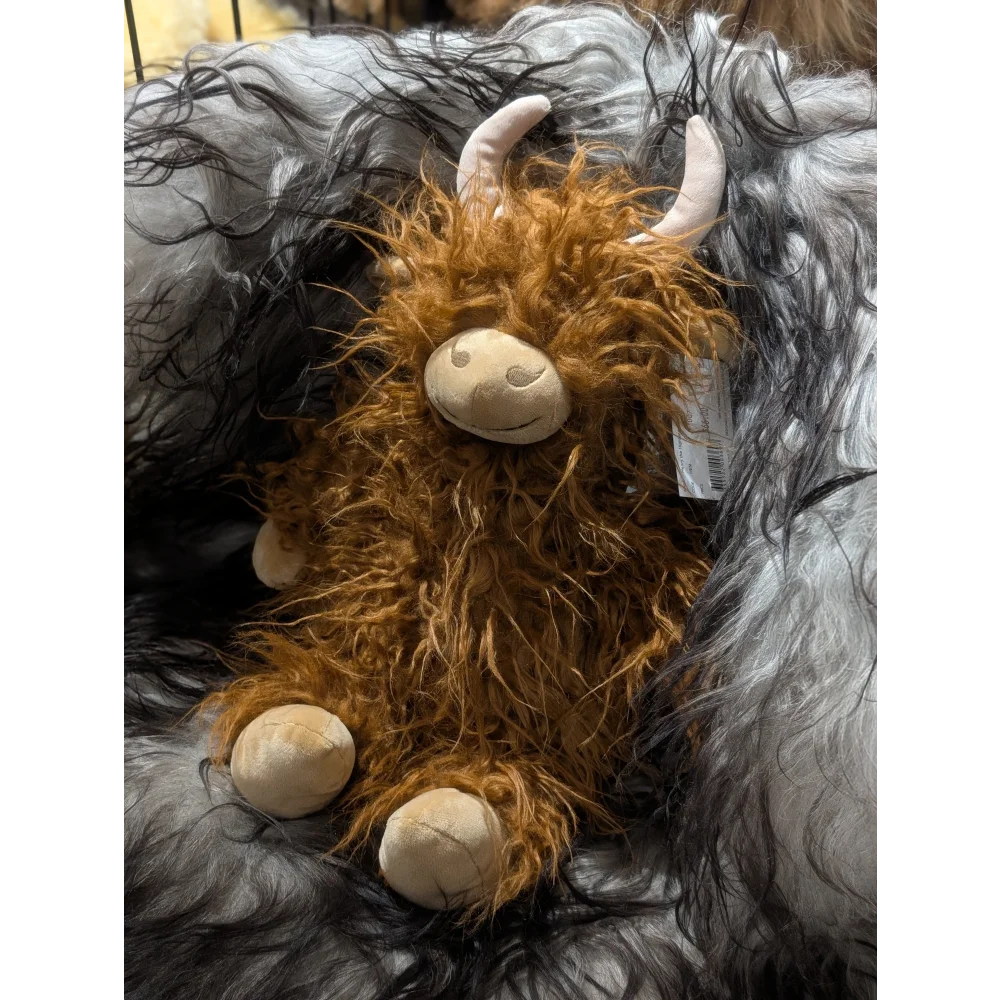Cute brown Henry farm yak plush toy with white horns and feet