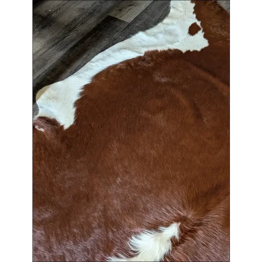 Hereford#108 extra large cowhide rug with brown white patches, cowhides make beautiful rugs