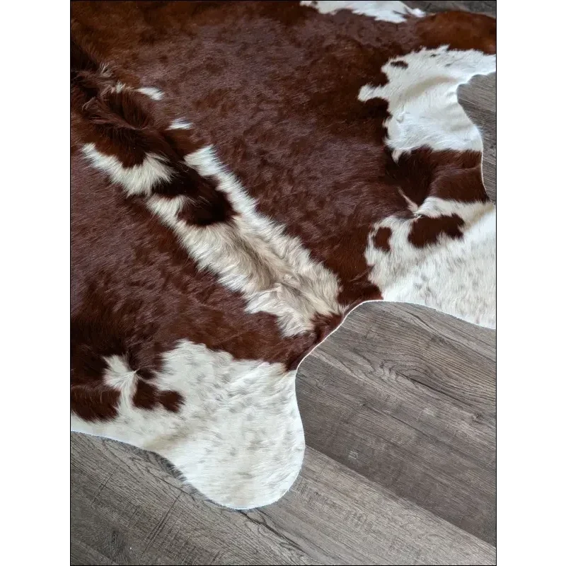 Lovely extra large Hereford#109 cowhide rug, brown white patches, soft underfoot