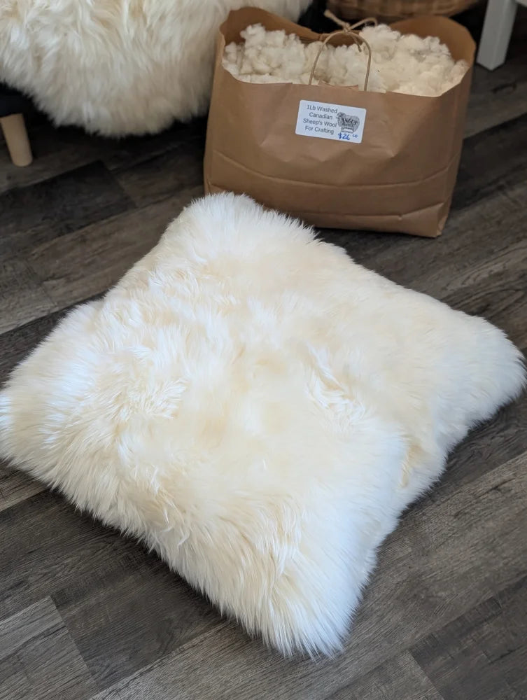 Fluffy cream merino sheepskin pillow stuffed with Canadian sheep’s wool