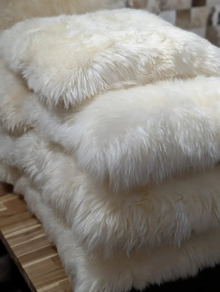 White fluffy throw blanket stuffed with Canadian sheep’s wool