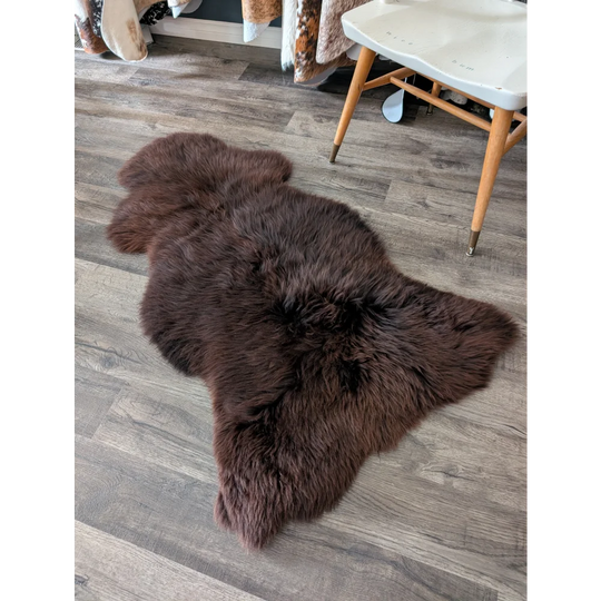 A plush dark brown angus oliver sheepskin rug 54 x 28 made from soft fluffy british sheepskin perfect for canada cowhide rugs