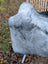 A soft plush gray faux fur hat with textured surface made from long wool icelandic sheepskin material
