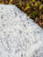 White curly spotted icelandic sheepskin rug with plush textured surface medium spotted icelandic wool blanket