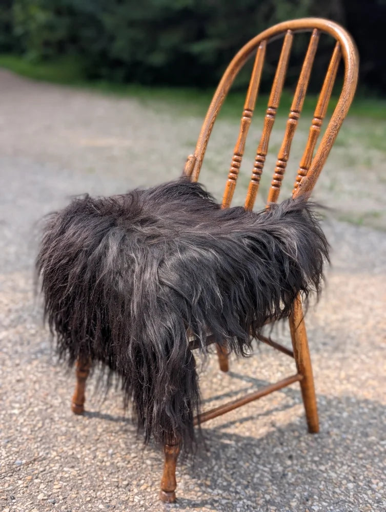 Thick natural black icelandic sheepskin chair square with shaggy long strands faux fur cushion for comfort