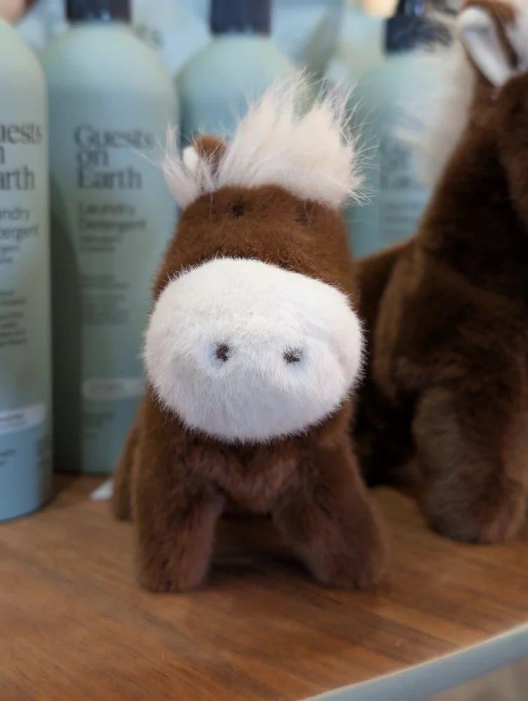 Large size brown plush horse toy jorge the pony with white fluffy mane and snout and simple black embroidered eyes