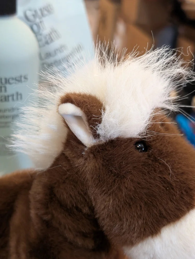 A large size plush brown and white stuffed animal pony with fluffy mane and soft fur named jorge the pony