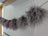 Gray fluffy feather boa in mushroom sheepskin pom poms