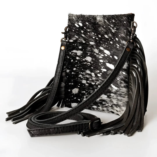 Black and white speckled genuine leather cowhide crossbody bag with fringe, Angus Oliver Canada