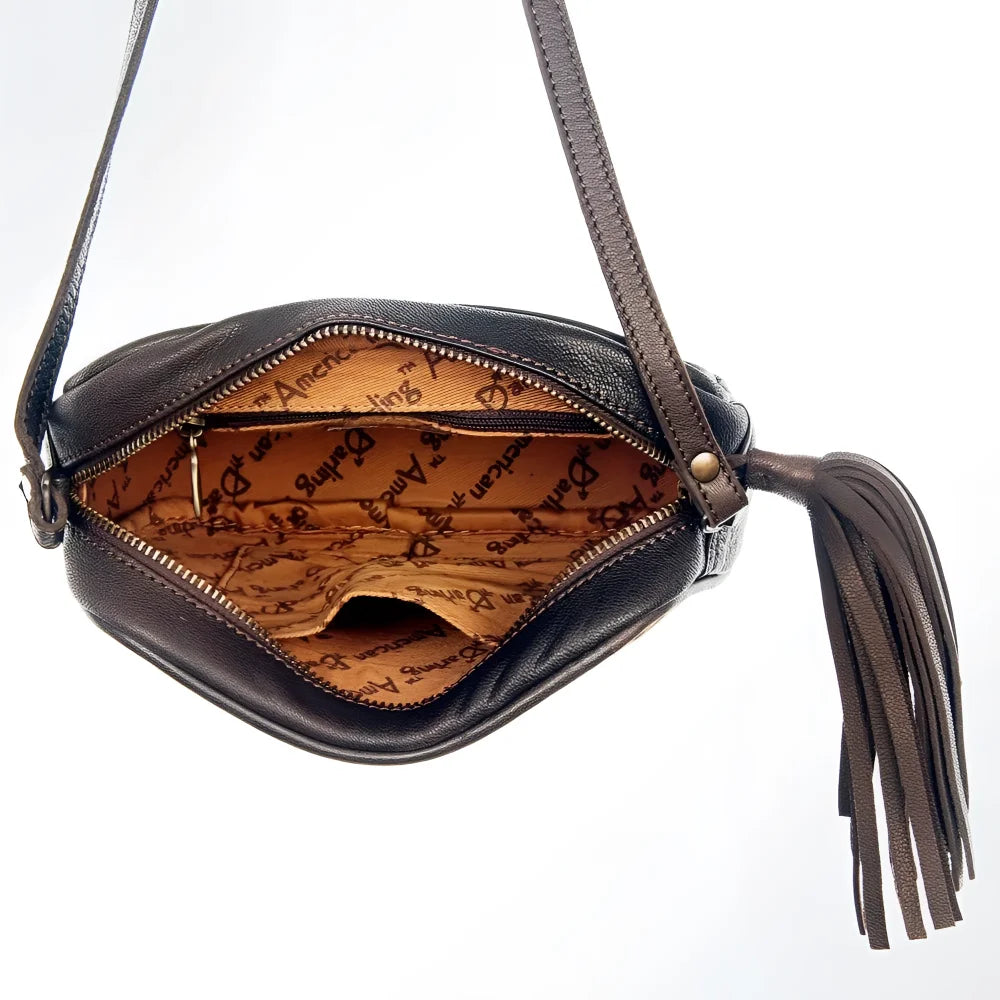 Dark brown full-grain leather crossbody bag with real hair-on tassel