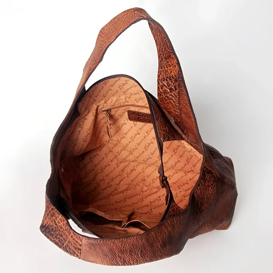 Genuine leather hobo bag with brown texture and script lining by Angus Oliver Canada