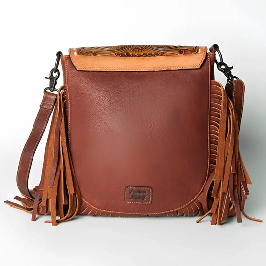 Hand-tooled floral full-grain leather messenger bag with fringe