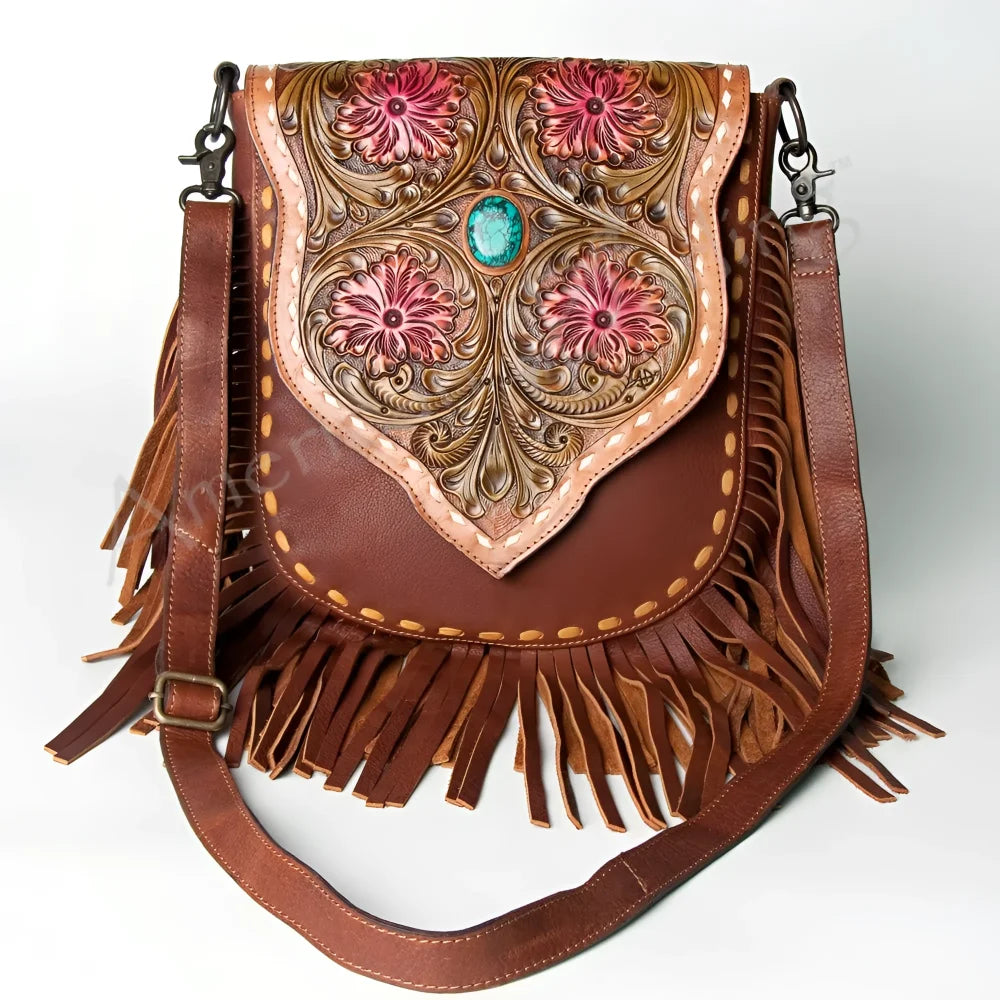 Hand-tooled floral full-grain leather messenger bag with turquoise accent