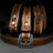 A tan leather belt with intricate floral tooling and silver toned hardware perfect for everyday wear