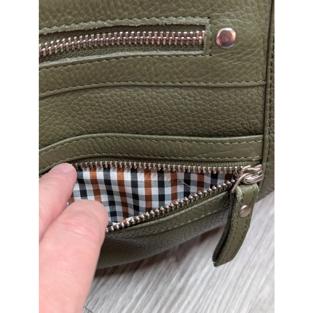 Olive green leather crossbody bag with textured faux leather and gingham lining