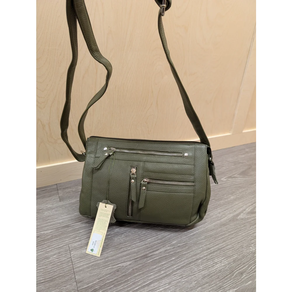 Olive green textured leather crossbody bag with zippers