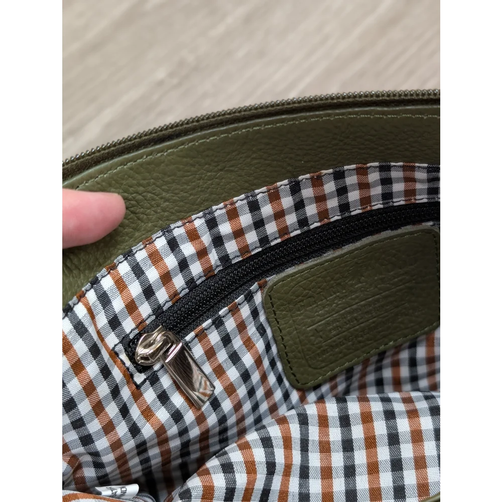 Olive green leather crossbody bag with checkered interior lining