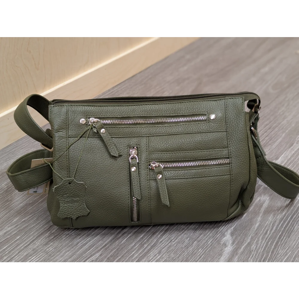 Olive green pebbled leather crossbody bag with silver zippers