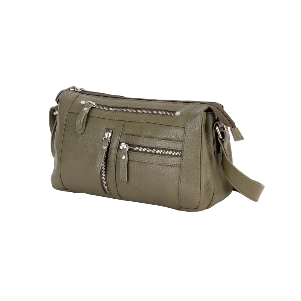 Olive green leather crossbody bag with zippers and adjustable strap