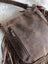 Mojave tassel bag in hunter leather with fringes and stitching