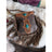 Brown leather mojave tassel bag with intricate tooled designs, turquoise stone accents, and flowing fringe in rich hunter leather