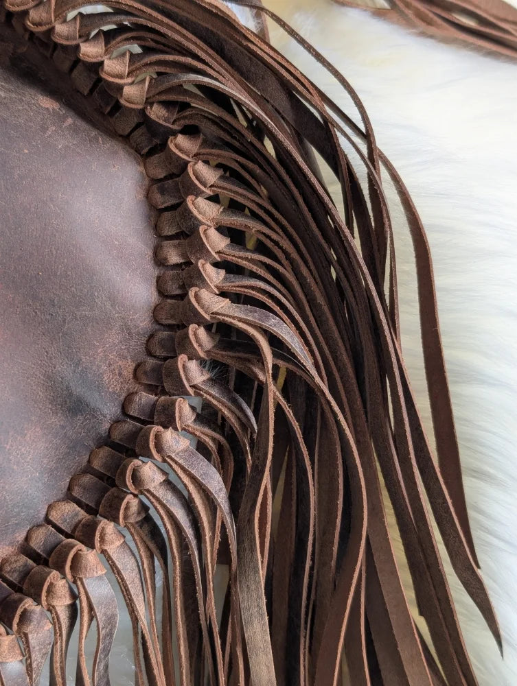 Brown leather fringe with braided edges on Mojave tassel bag