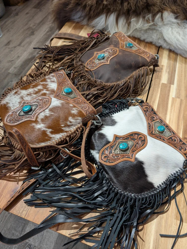 Three handcrafted mojave tassel bags with rich hunter leather cowhide panels flowing fringe and turquoise stones free with 500+ spend