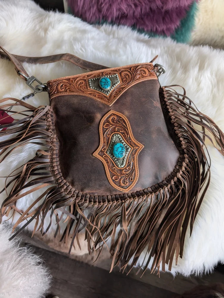 Mojave tassel bag in brown hunter leather with fringe and turquoise accents