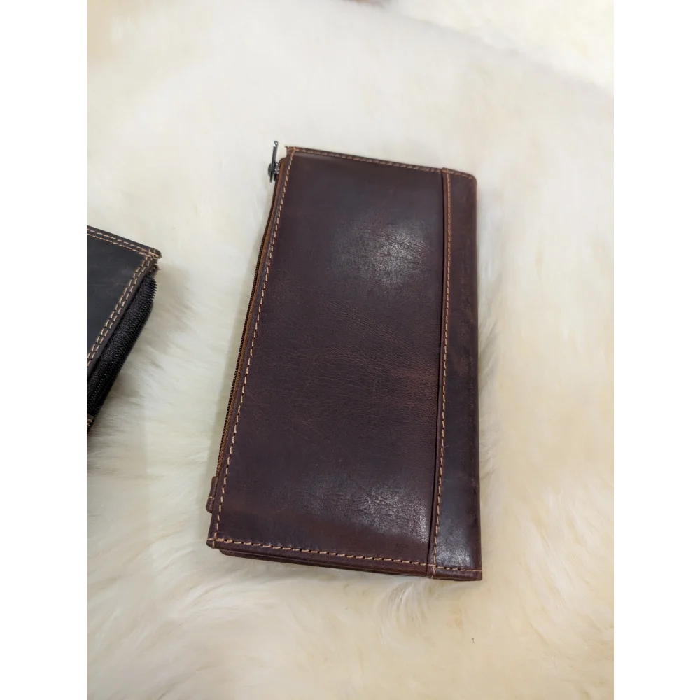 Angus Oliver brown leather wallet with sheepskin stitching and logo