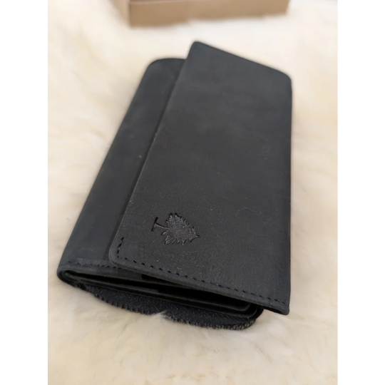 Soft black leather wallet with Angus Oliver sheepskin maple leaf design