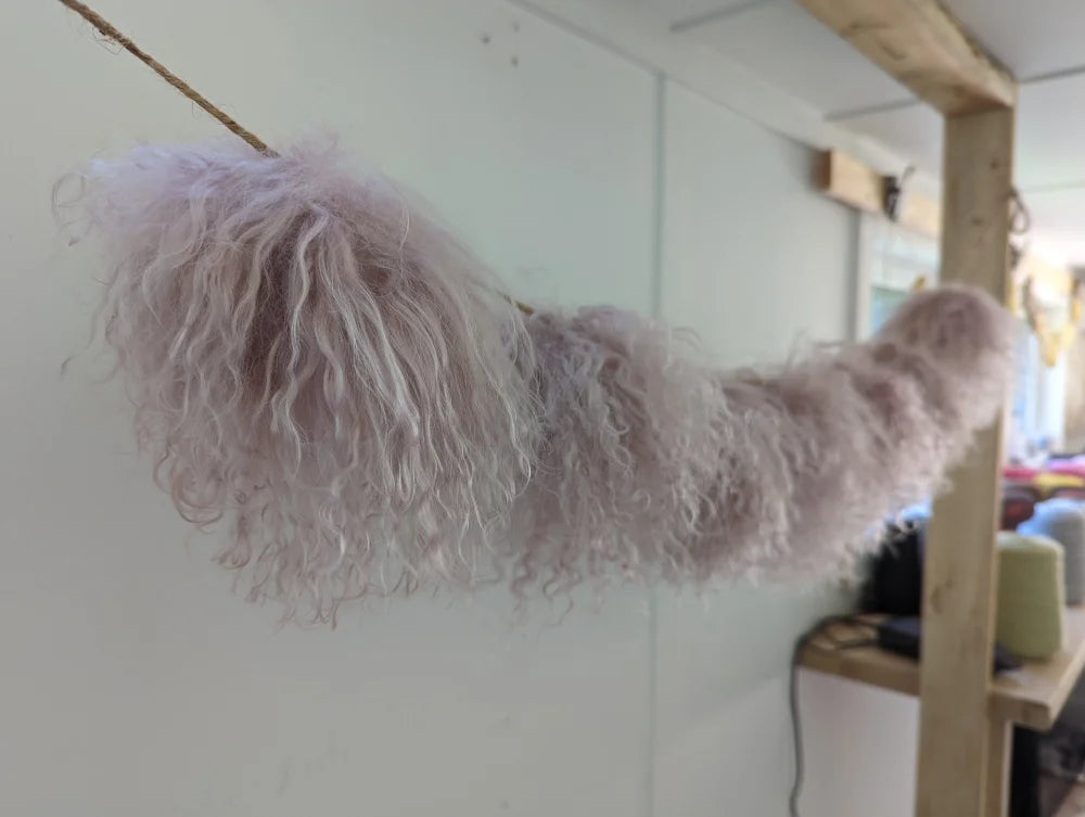 Cozy light pink sheepskin pom pom cat hammock chair by Angus Oliver