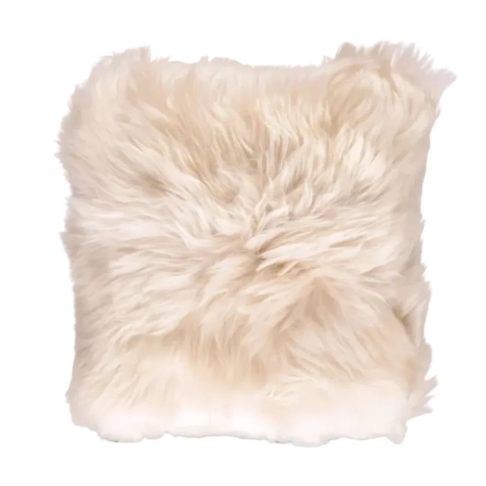 Cream-colored plush linen colour merino sheepskin cushion cover with soft natural fur edges and cotton backs