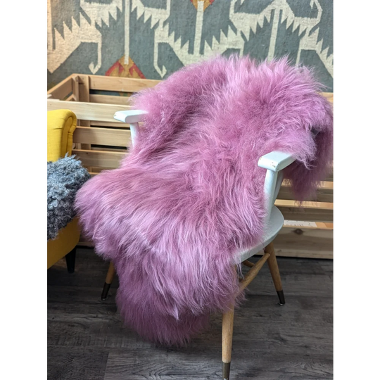 Cozy pink Icelandic sheepskin on Angus Oliver luxury chair
