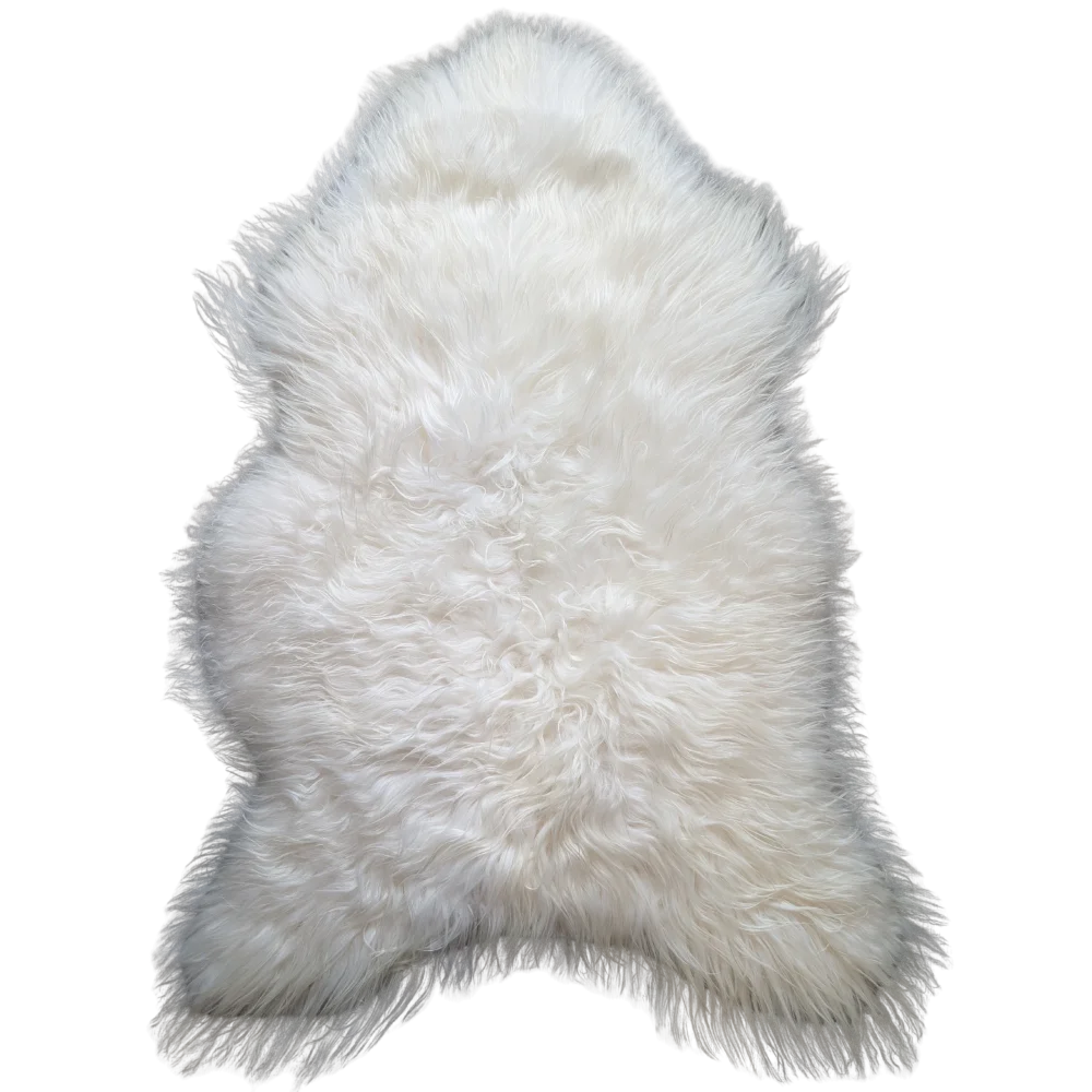 Natural white icelandic sheepskin rug with soft dense fur and irregular shape perfect for cozy decor