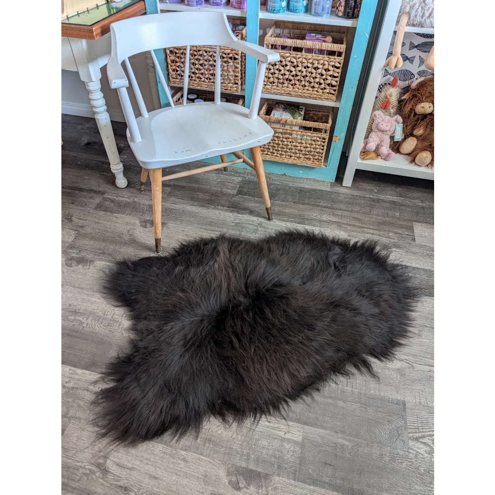 Black fluffy luv33 large soft icelandic sheepskin rug with natural shape and long wool icelandic texture