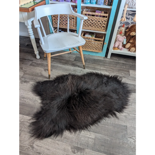 Black fluffy luv33 large soft icelandic sheepskin rug with natural shape and long wool icelandic texture