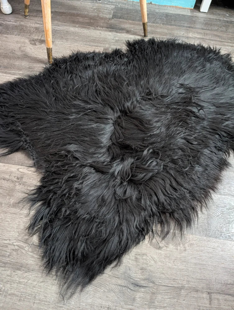 Black fluffy luv35 50 x 36 large soft icelandic sheepskin rug with long wool and natural irregular shape