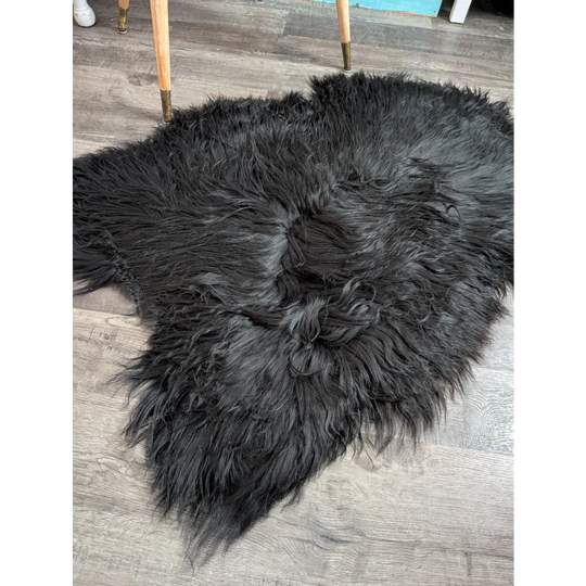 Black fluffy luv35 50 x 36 large soft icelandic sheepskin rug with long wool and natural irregular shape